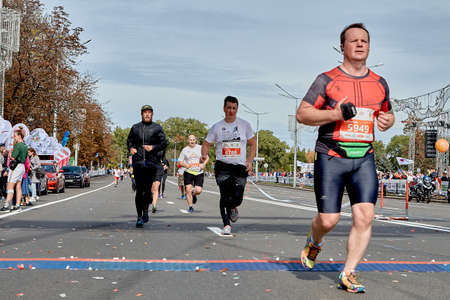 September 15, 2019 Minsk Belarus A marathon race in which participants run to the finish line on a city road.Healthy lifestyleのeditorial素材