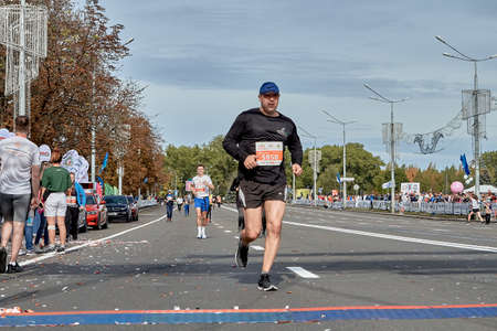 September 15, 2019 Minsk Belarus A participant runs to the finish of the half marathon in Minskのeditorial素材