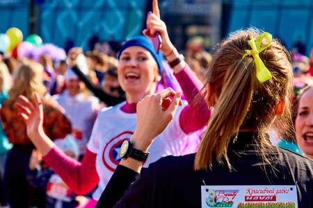 March 8, 2019 Minsk Belarus Women's Day Race on March 8 Many emotional women sing at a street concertのeditorial素材