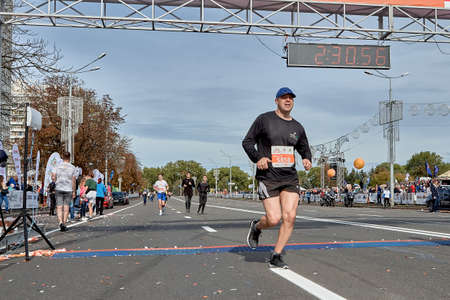 September 15, 2019 Minsk Belarus A participant crosses the finish line of the half marathon in Minskのeditorial素材