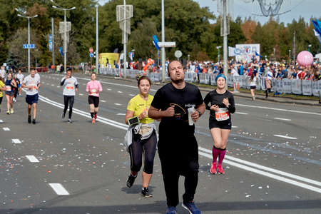 September 15, 2019 Minsk Belarus Marathon participants run on a city roadのeditorial素材