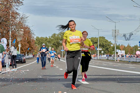September 15, 2019 Minsk Belarus A marathon race in which two active participants run on a city roadのeditorial素材