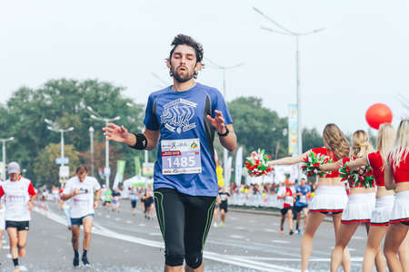 September 9, 2018 Minsk Belarus Half Marathon Minsk 2018 Close up of an active athlete running a marathonのeditorial素材