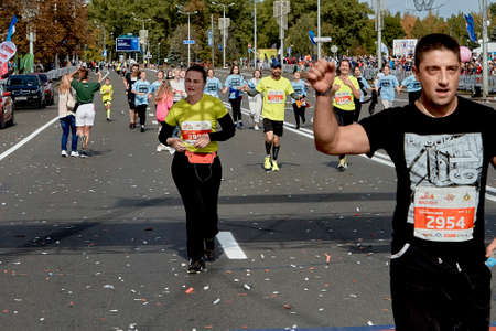 September 15, 2019 Minsk Belarus Minsk hosts a half-marathon in which athletes run to the finish line with their hands upのeditorial素材