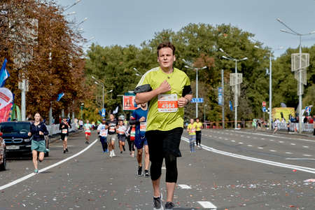 September 15, 2019 Minsk Belarus A marathon race in which an active participant runs along a city roadのeditorial素材