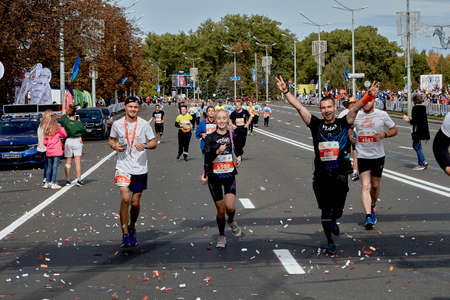 September 15, 2019 Minsk Belarus Minsk hosts a half-marathon in which happy athletes run with their hands upのeditorial素材