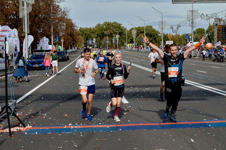 September 15, 2019 Minsk Belarus Minsk hosts a half-marathon in which happy athletes cross the finish line with their hands upのeditorial素材