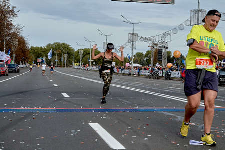 September 15, 2019 Minsk Belarus Minsk hosts a half marathon where successful men and women cross the finish lineのeditorial素材