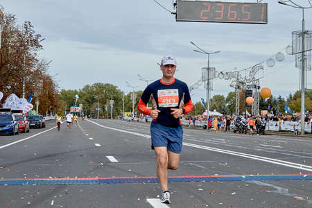 September 15, 2019 Minsk Belarus A marathon race in which an athlete crosses the finish lineのeditorial素材