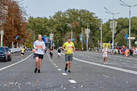 September 15, 2019 Minsk Belarus Minsk hosts a half-marathon, where two participants run to the finish line on the city roadのeditorial素材