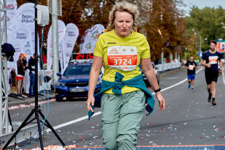 September 15, 2019 Minsk Belarus Close-up of a woman crossing the finish line of a marathonのeditorial素材