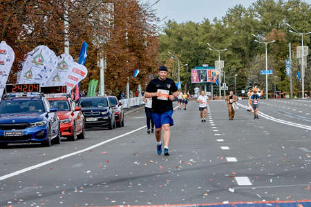 September 15, 2019 Minsk Belarus Minsk hosts a half-marathon where an active person runs along a city roadのeditorial素材