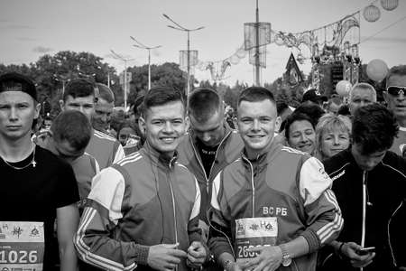September 15, 2019 Minsk Belarus Two young strong athletes are standing in front of the marathonのeditorial素材