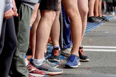 There are many athletes in front of the starting lineの写真素材