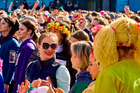 March 8, 2019 Minsk Belarus Women's Day Race on March 8 Beautiful happy women stand at a street concertのeditorial素材