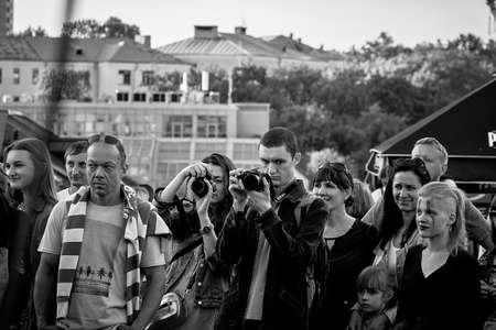 June 1, 2019 Festivities in the city on the day of Swedish culture In the black-and-white image, a man and woman are standing on the street with cameras.のeditorial素材