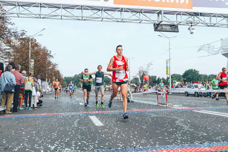 September 9, 2018 Minsk Belarus Half Marathon Minsk 2018 A marathon race in which a marathon runner crosses the finish line ahead of the participantsのeditorial素材