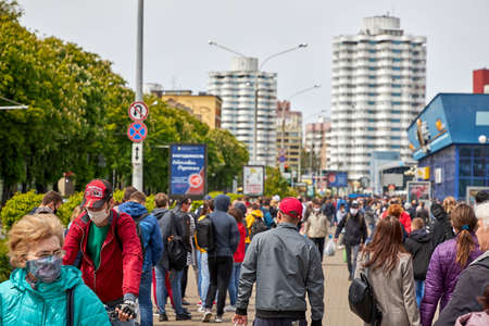 May 24 2020 Minsk Belarus Masked people walk down the street in protest against the current governmentのeditorial素材