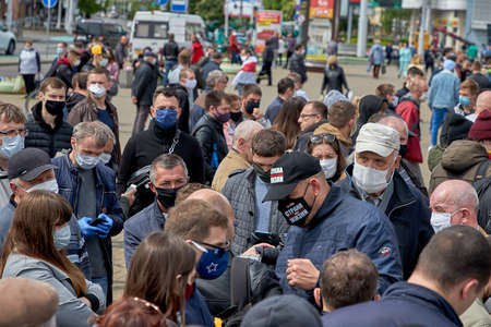 May 24 2020 Minsk Belarus There is one opposition leader who communicates with masked people during a protestのeditorial素材