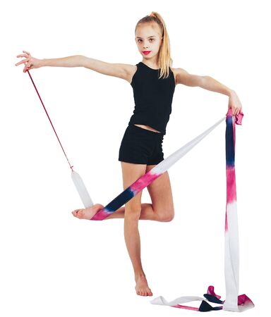 Young girl athlete with white hairstands with gymnastics ribbonの写真素材