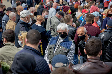 May 24 2020 Minsk Belarus Two Mature masked men went out to register as opposition candidatesのeditorial素材