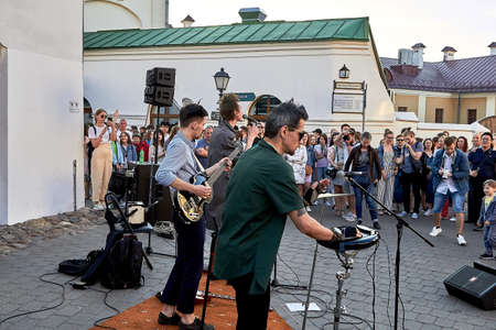 June 1, 2019 Minsk Belarus Three musicians play at a street concertのeditorial素材