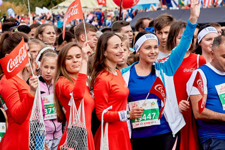 September 15, 2019 Minsk Belarus There are a lot of fans of a healthy lifestyle with small flags that stand before the start of the marathonのeditorial素材