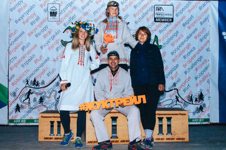 July 6-7, 2019 Village Petrevichi Minsk region Belarus Beetle trail 12 Midsummer There are men and women in national costumes standing on the stage of the winners of the raceのeditorial素材