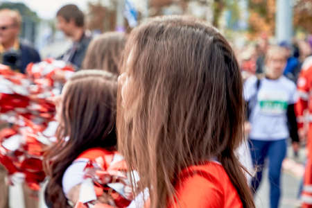 September 15, 2019 Minsk Belarus There are close-ups of beautiful cheerleader girls before the start of the raceのeditorial素材