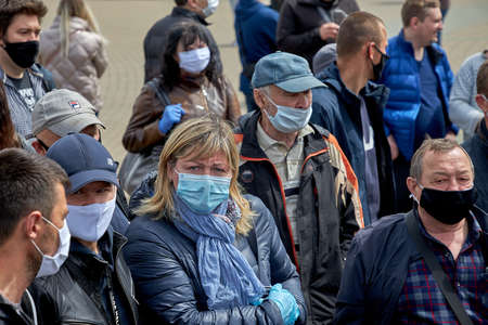 May 24 2020 Minsk Belarus A crowd of unidentified masked people stands close to each other in protest against the current governmentのeditorial素材