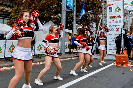 September 15, 2019 Minsk Belarus Before the start of the marathon here are dancing girls cheerleadersのeditorial素材