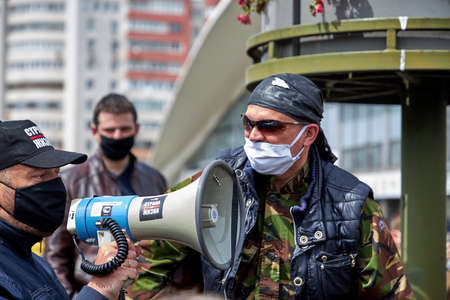 May 24 2020 Minsk Belarus Close-up of the masked opposition leader speaking into a loudspeakerのeditorial素材