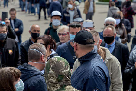 May 24 2020 Minsk Belarus A crowd of masked people stands at a street protestのeditorial素材