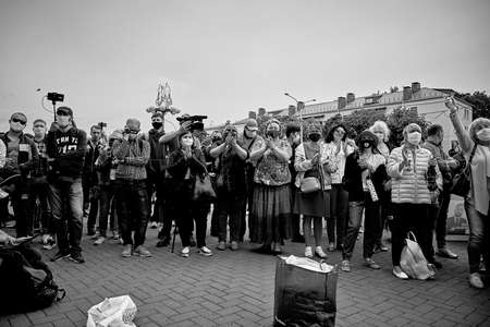 June 7 2020 Minsk Belarus Masked people stand at a rally near packages to raise moneyのeditorial素材