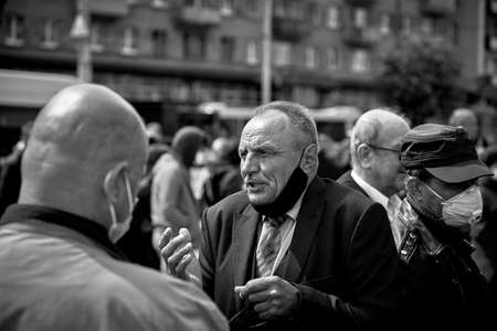 May 24 2020 Minsk Belarus An elderly man tells people at a protest demonstrationのeditorial素材