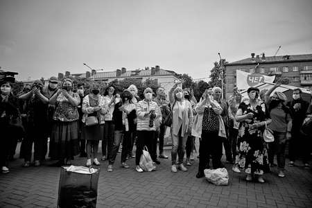 June 7 2020 Minsk Belarus Masked people stand at a rally near a package to collect moneyのeditorial素材