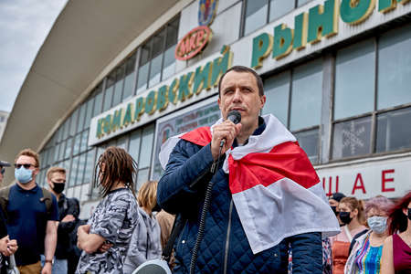 June 7 2020 Minsk Belarus The leader of the opposition with a microphone stands at the protestのeditorial素材