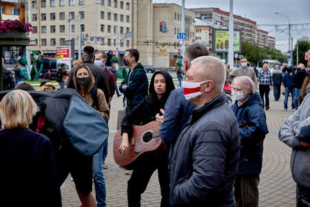 June 14 2020 Minsk Belarus A young woman plays a guitar during a protest against the current...