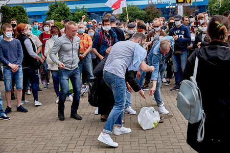June 7 2020 Minsk Belarus Rally where masked people collect money in a cellophane bagのeditorial素材