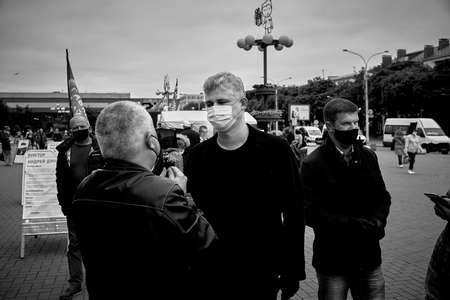 June 14 2020 Minsk Belarus In a black and white photo a man interviews a presidential candidate