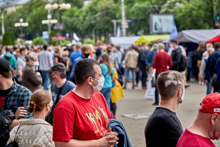 June 7 2020 Minsk Belarus People in medical masks stand in line to leave signatures for presidential candidatesのeditorial素材