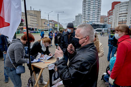 June 14 2020 Minsk Belarusian people walk down the streetのeditorial素材