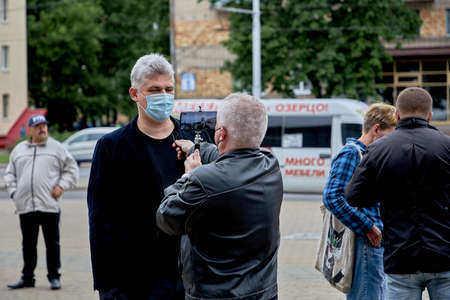 June 14 2020 Minsk Belarusian people walk down the streetのeditorial素材