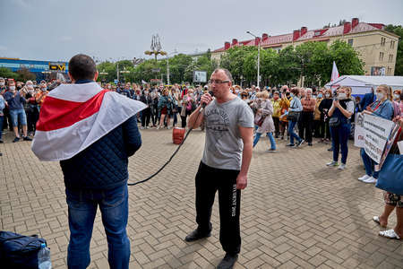 June 7 2020 Minsk Belarus A rally where a man with a microphone speaks about his movement against the arbitrariness of the authoritiesのeditorial素材