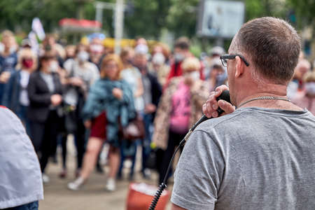 June 7 2020 Minsk Belarus An opposition leader with a microphone speaks at a protest rallyのeditorial素材