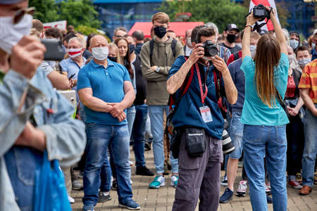 June 7 2020 Minsk Belarus Photographers with cameras work at a protest rallyのeditorial素材