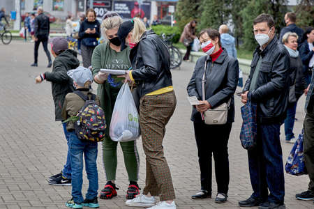 June 14 2020 Minsk Belarusian people walk down the streetのeditorial素材