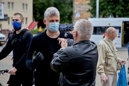 June 14 2020 Minsk Belarusian people walk down the streetのeditorial素材