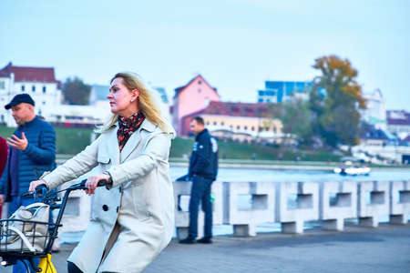 October 19, 2019 Minsk Belarus Girls walking along the embankmentのeditorial素材
