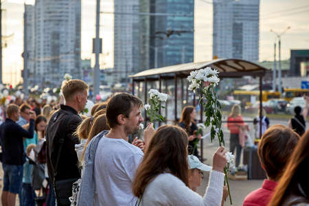 August 14 2020 Minsk Belarus Many people stand by the roadside to protest against violenceのeditorial素材
